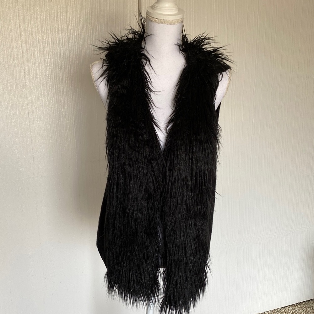 Furry fur vest with sweater knit in the back